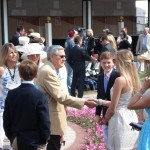 Derby winning trainer Carl Nafzger shaking hands in the paddock